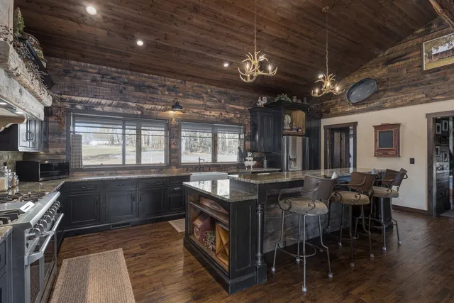 a view of balcony with floor to ceiling window with wooden floor