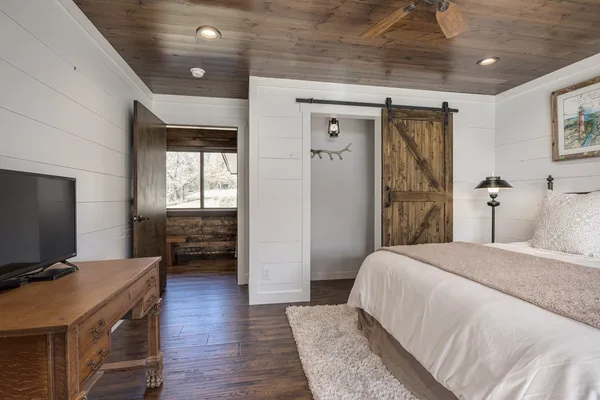 a view of an entryway with wooden floor