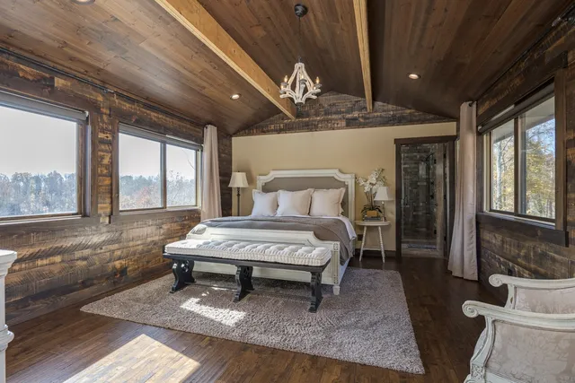 a bed room with furniture and a window