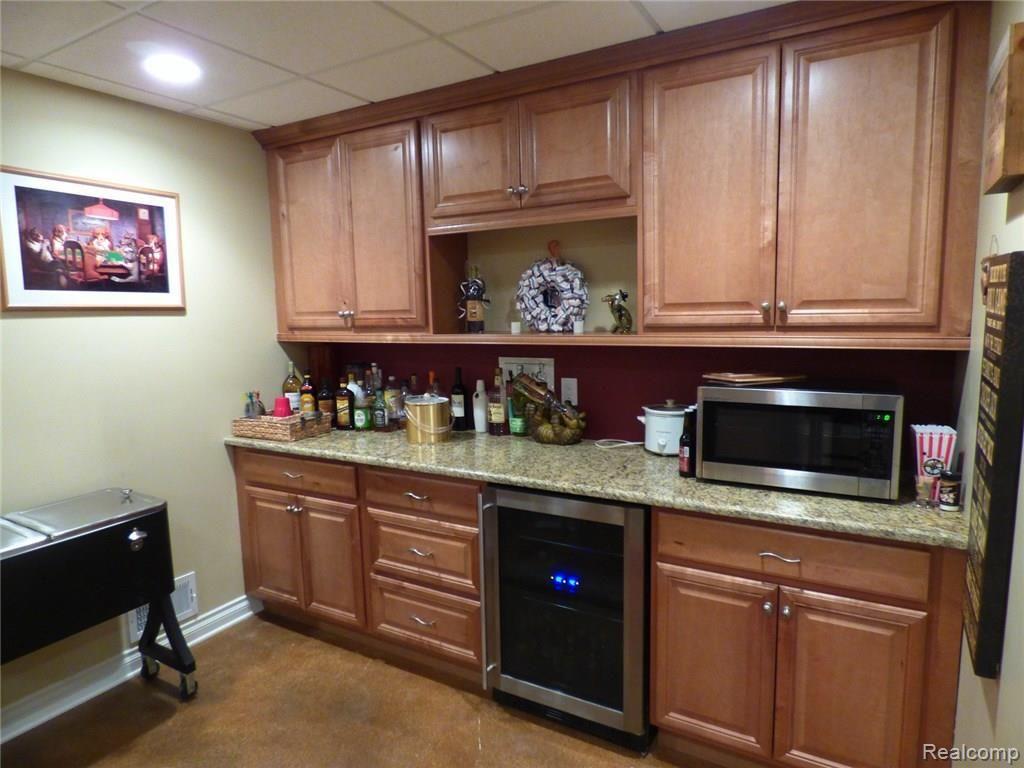 6137 Golf Club Road Howell, MI 48843 - Photo 19 of 45 16 WALK OUT BAR 2.JPG