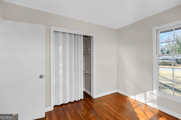 a view of bedroom with window