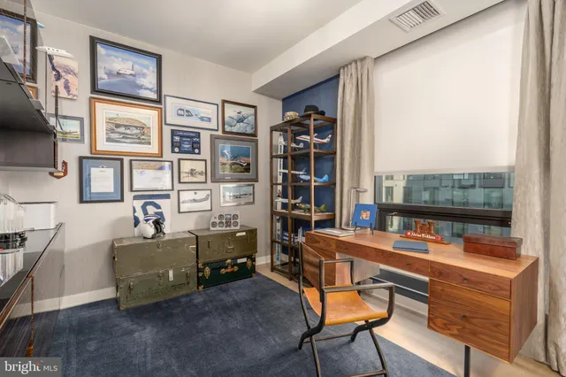 a room with furniture and a window