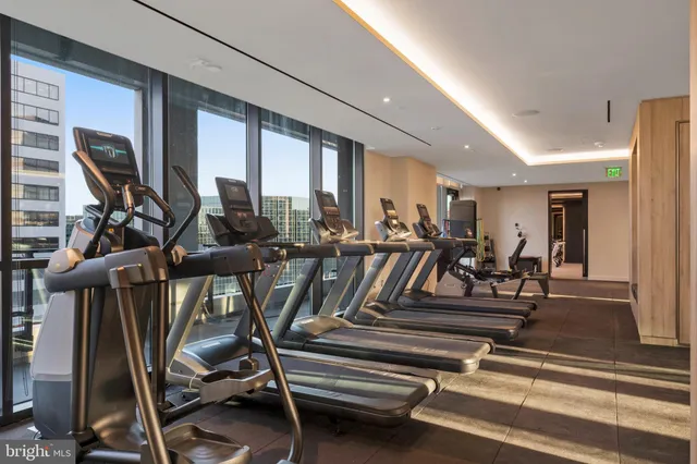 a patio with a table and chairs