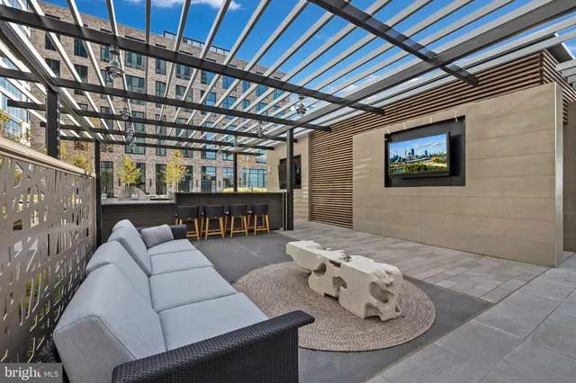 a kitchen with a sink and wooden cabinets