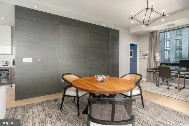 a view of a dining room with furniture