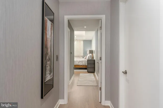 a view of a bedroom from a hallway