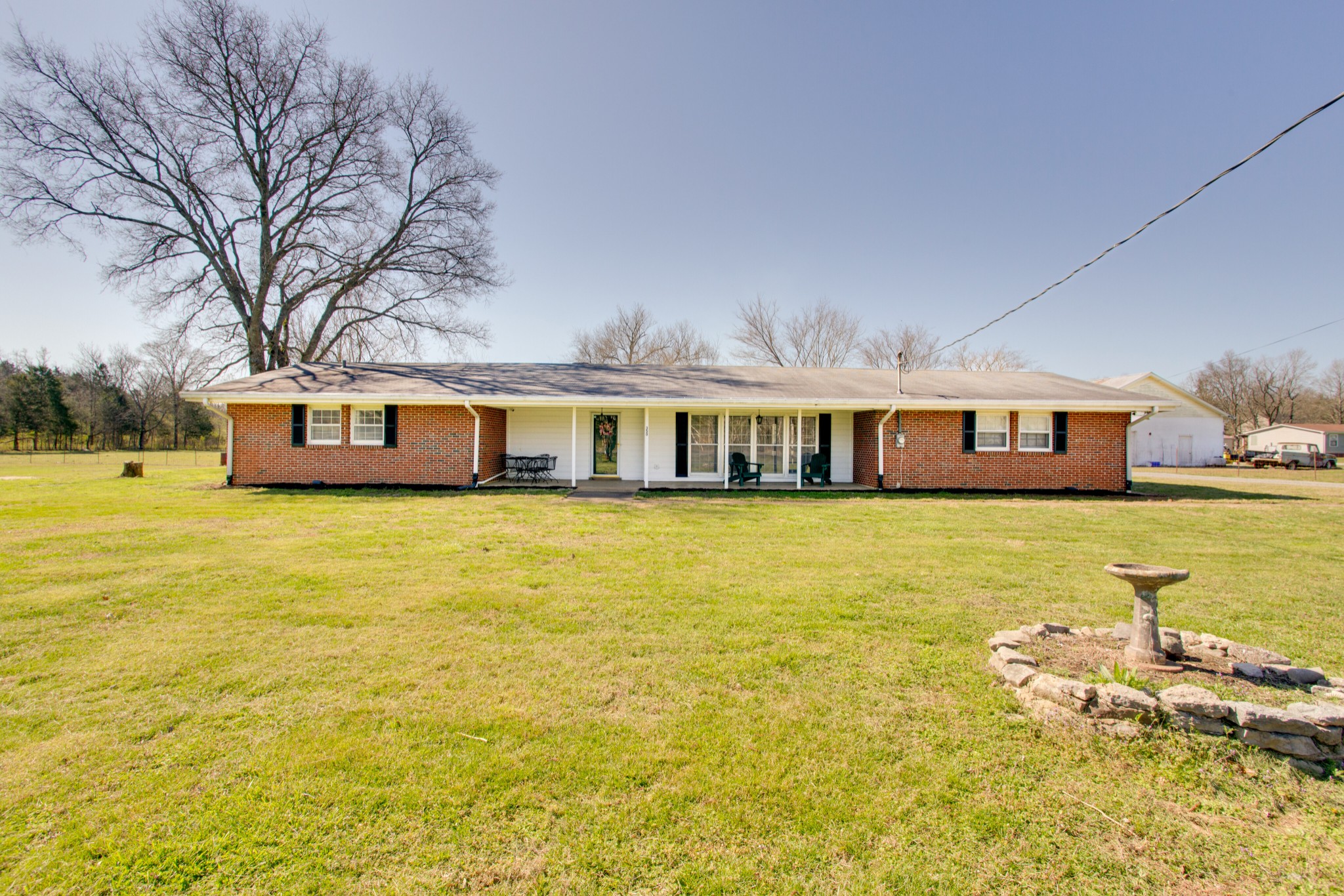 350 Flat Woods Road Lebanon, TN 37090 - Photo 1 of 33 a house view with swimming pool in front of it