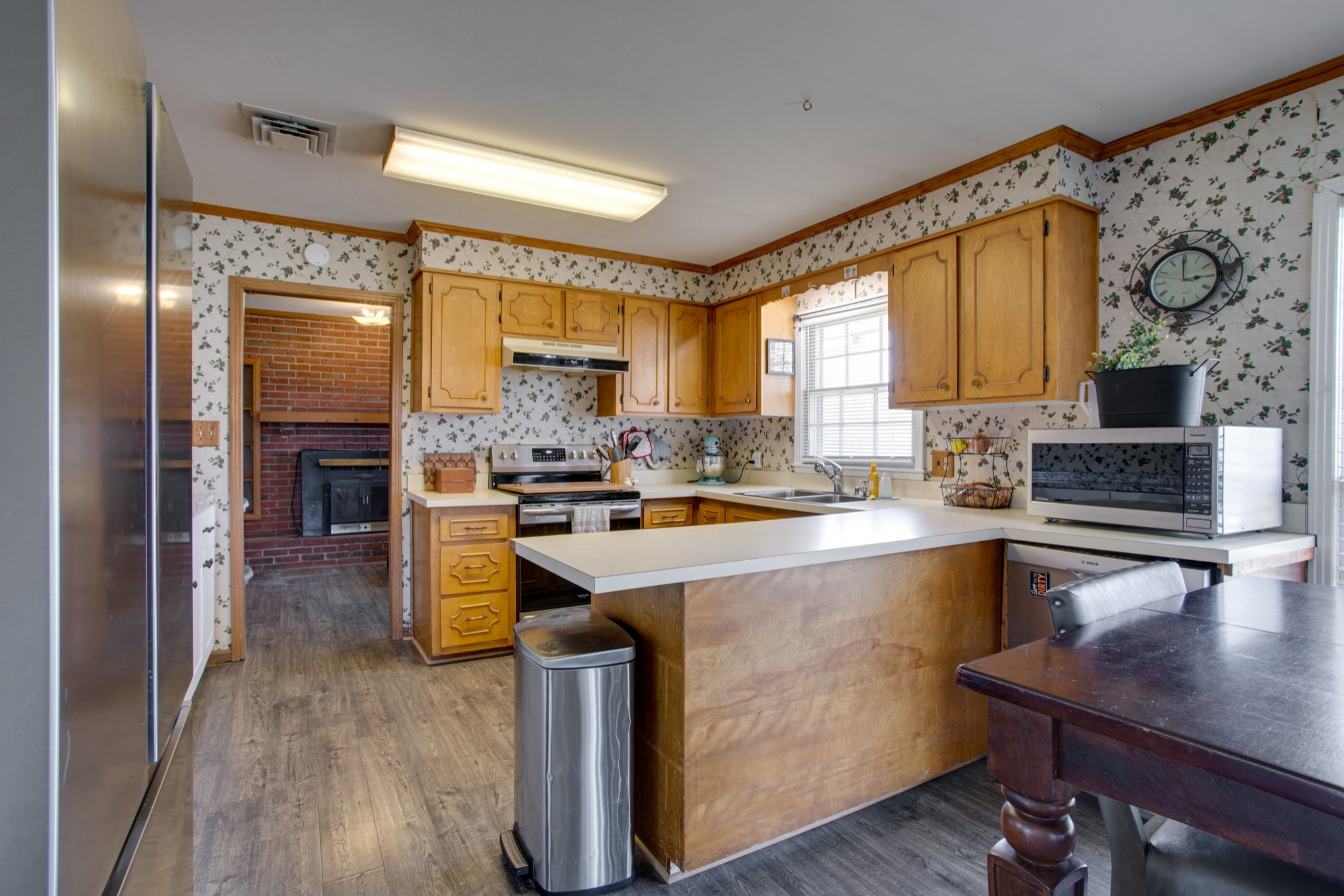 350 Flat Woods Road Lebanon, TN 37090 - Photo 12 of 33 a kitchen with a sink stove and cabinets