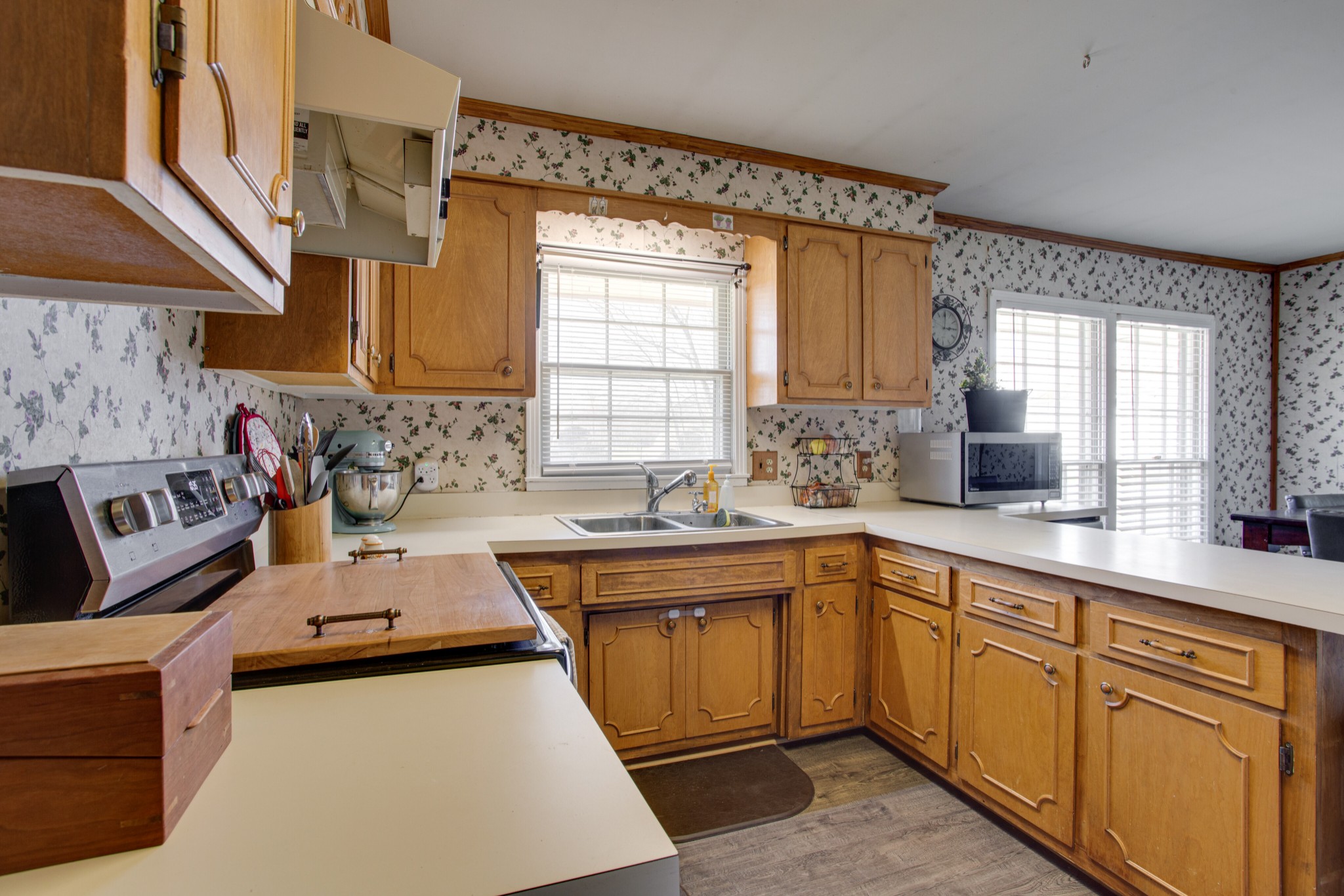 350 Flat Woods Road Lebanon, TN 37090 - Photo 13 of 33 a kitchen with stainless steel appliances granite countertop a sink stove and refrigerator