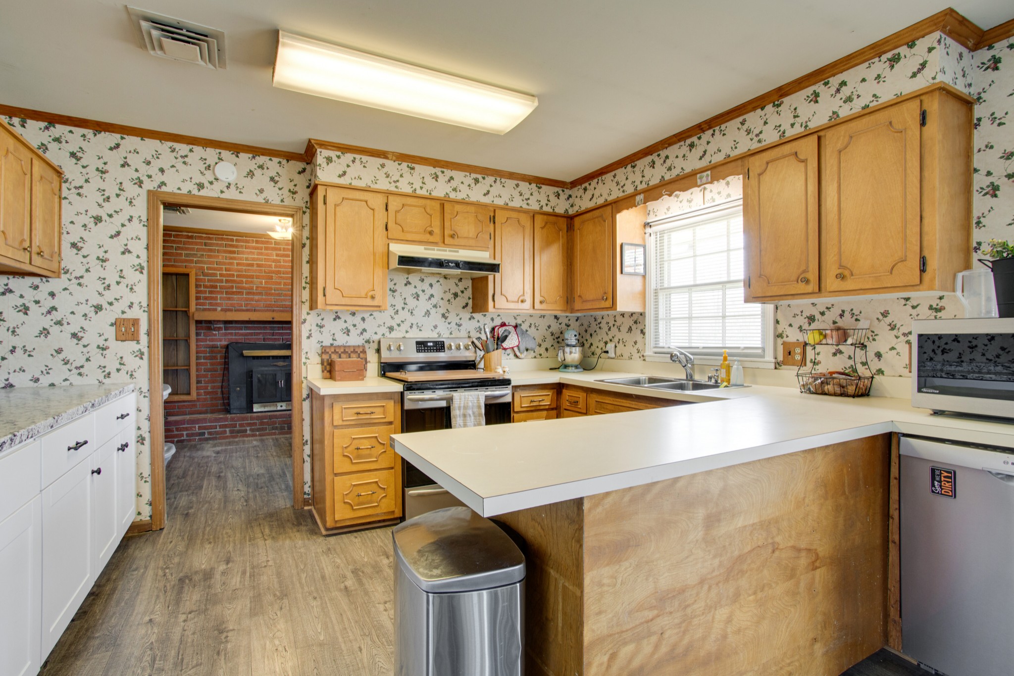 350 Flat Woods Road Lebanon, TN 37090 - Photo 14 of 33 a kitchen with a stove a sink and a refrigerator