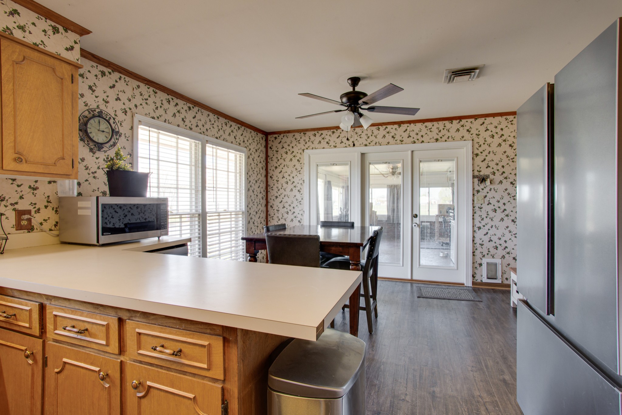 350 Flat Woods Road Lebanon, TN 37090 - Photo 16 of 33 a view of a dining room with furniture window and wooden floor