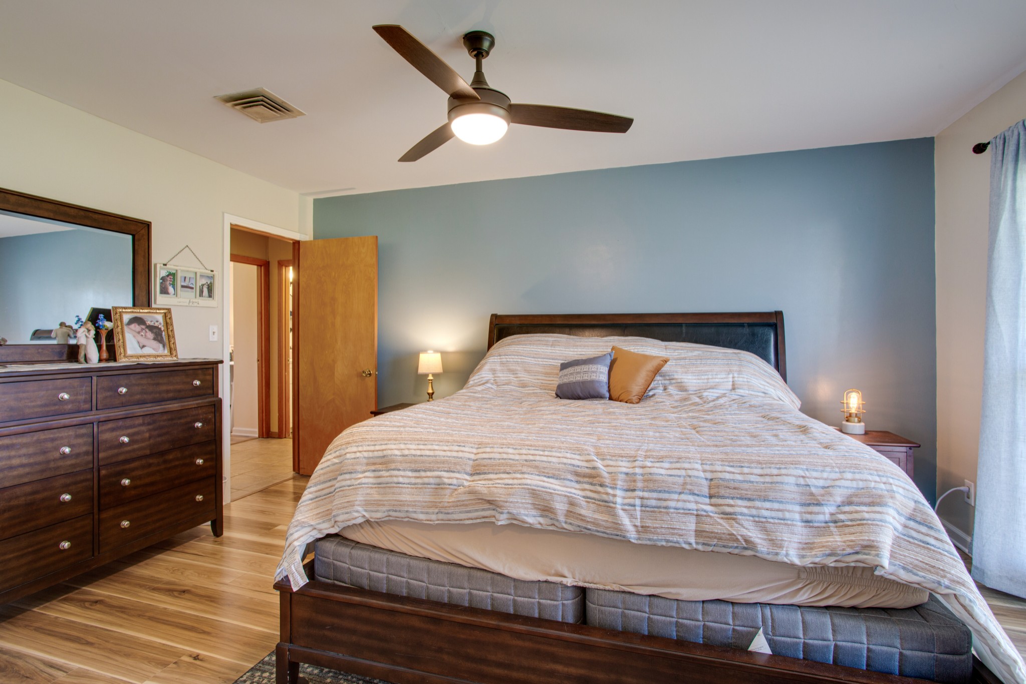 350 Flat Woods Road Lebanon, TN 37090 - Photo 20 of 33 a bedroom with a bed and a dresser