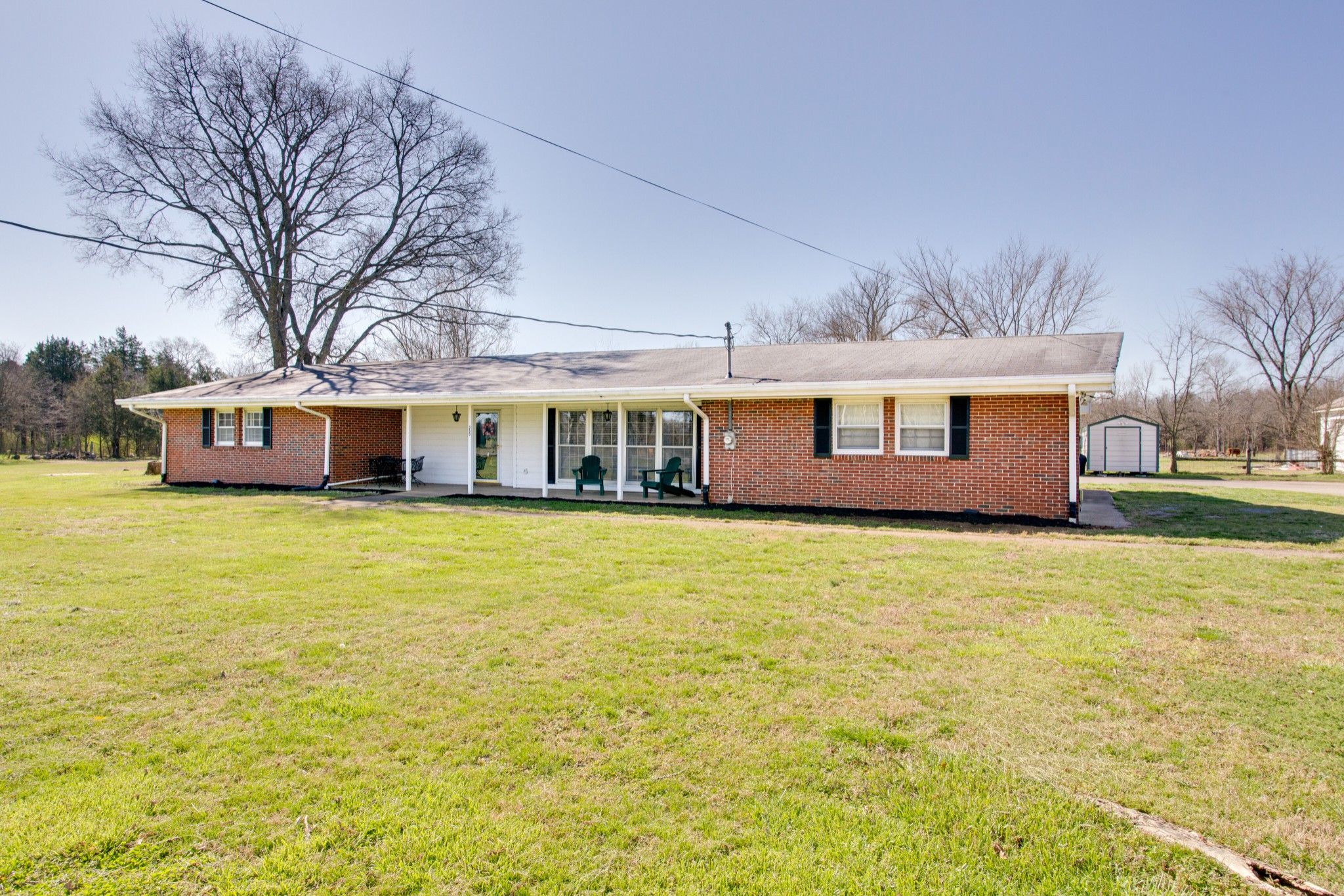 350 Flat Woods Road Lebanon, TN 37090 - Photo 2 of 33 a front view of house with yard and swimming pool