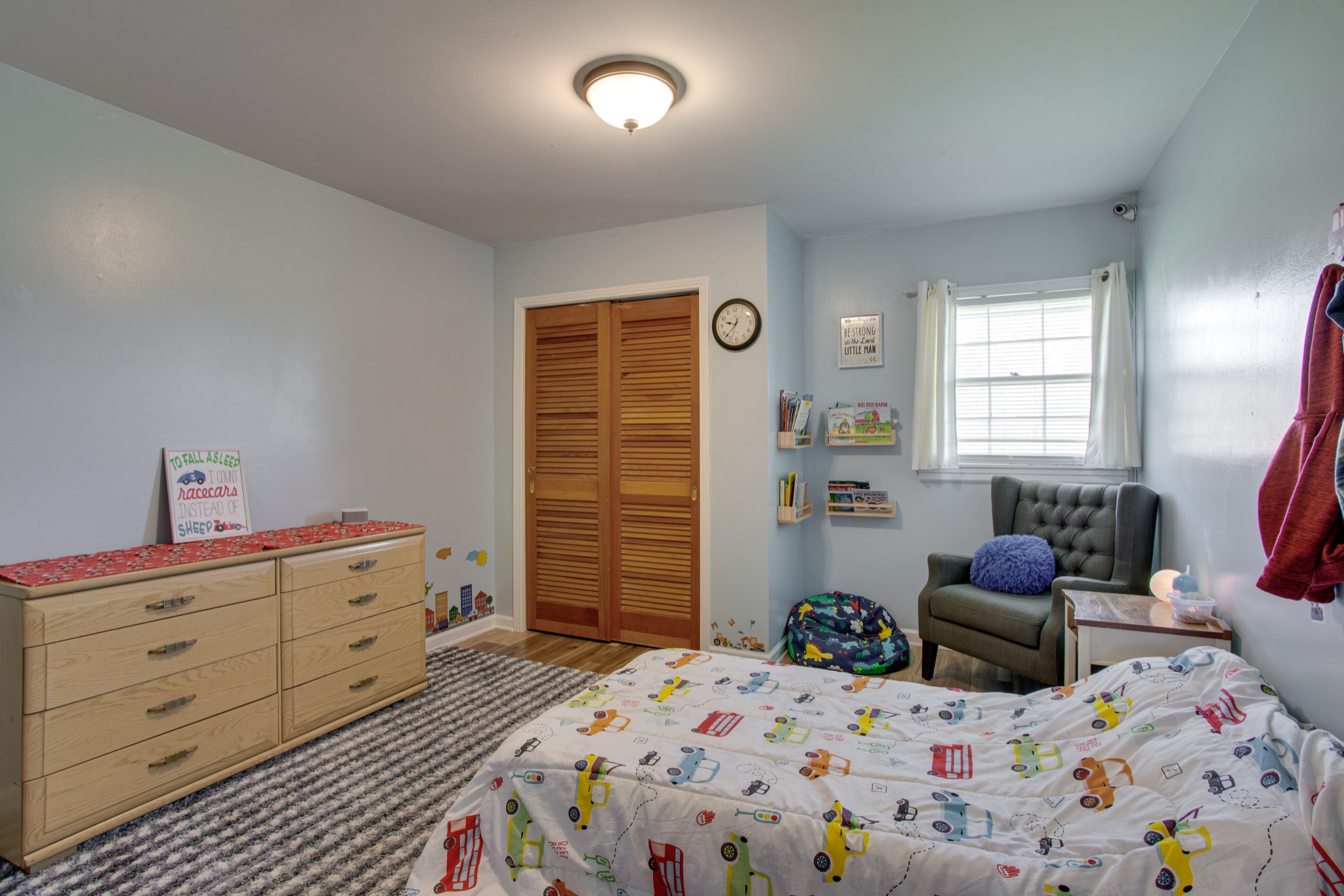 350 Flat Woods Road Lebanon, TN 37090 - Photo 24 of 33 a bedroom with a bed and a dresser in it