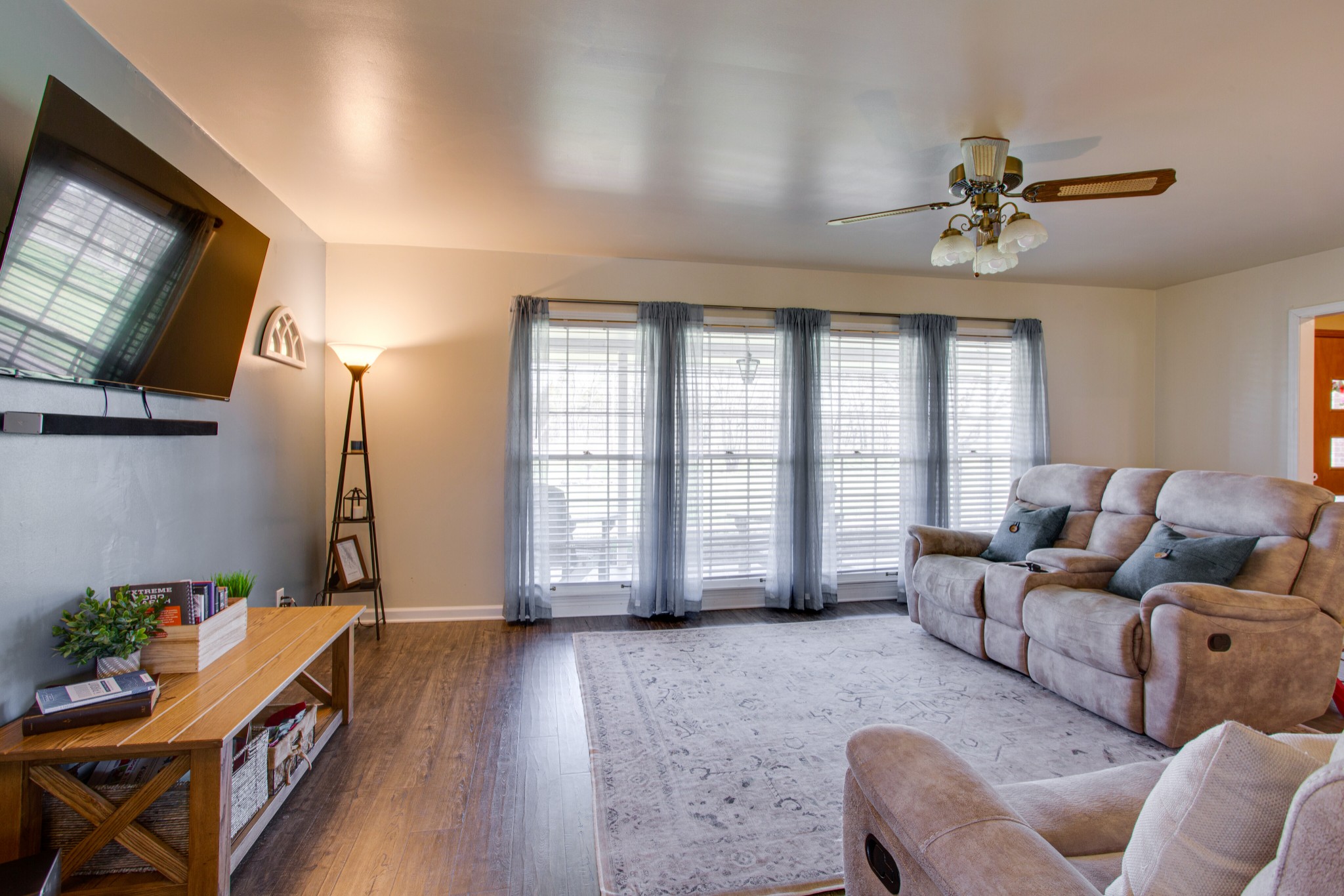 350 Flat Woods Road Lebanon, TN 37090 - Photo 7 of 33 a living room with furniture a flat screen tv and a window