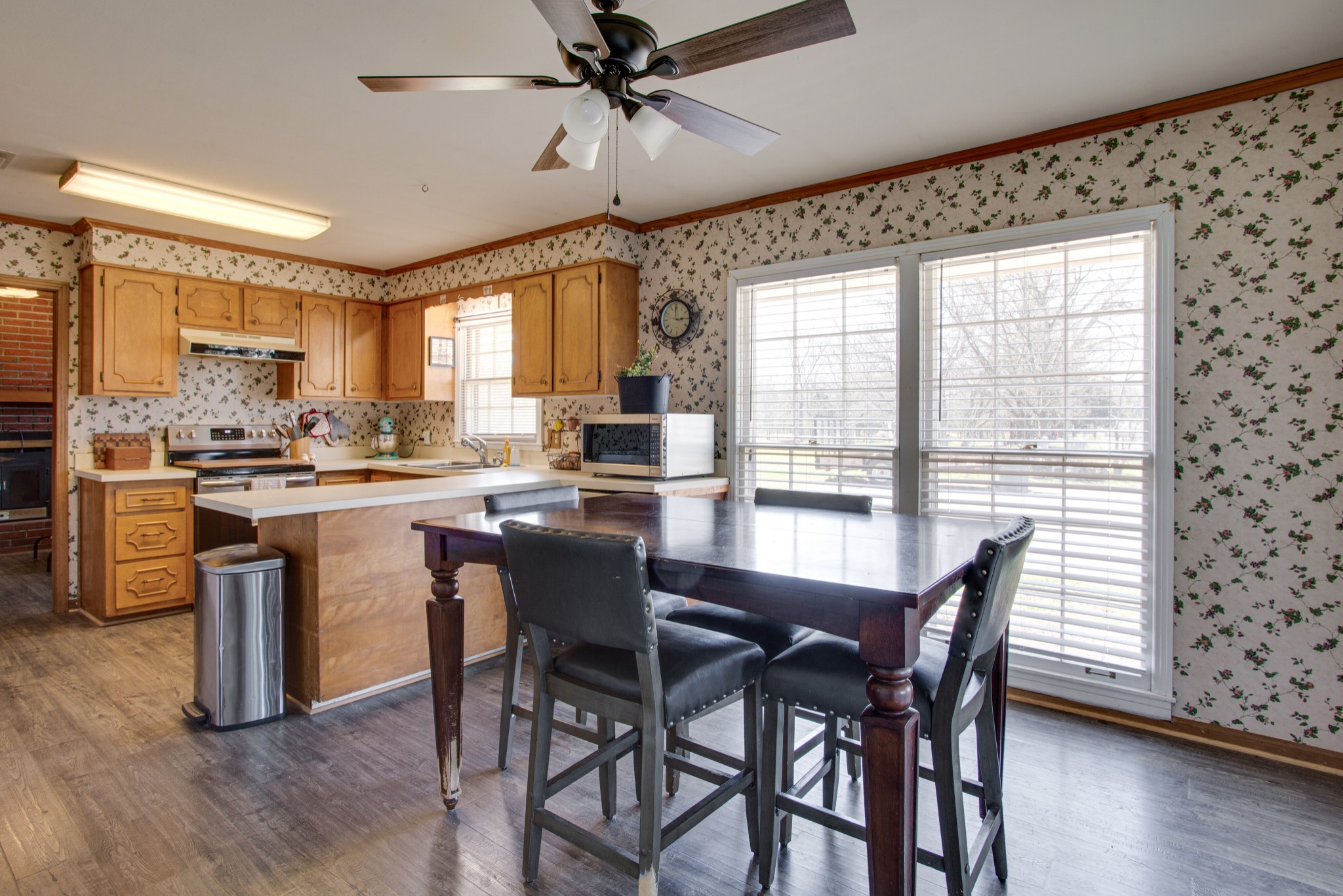 350 Flat Woods Road Lebanon, TN 37090 - Photo 9 of 33 a view of a dining room with furniture window and wooden floor
