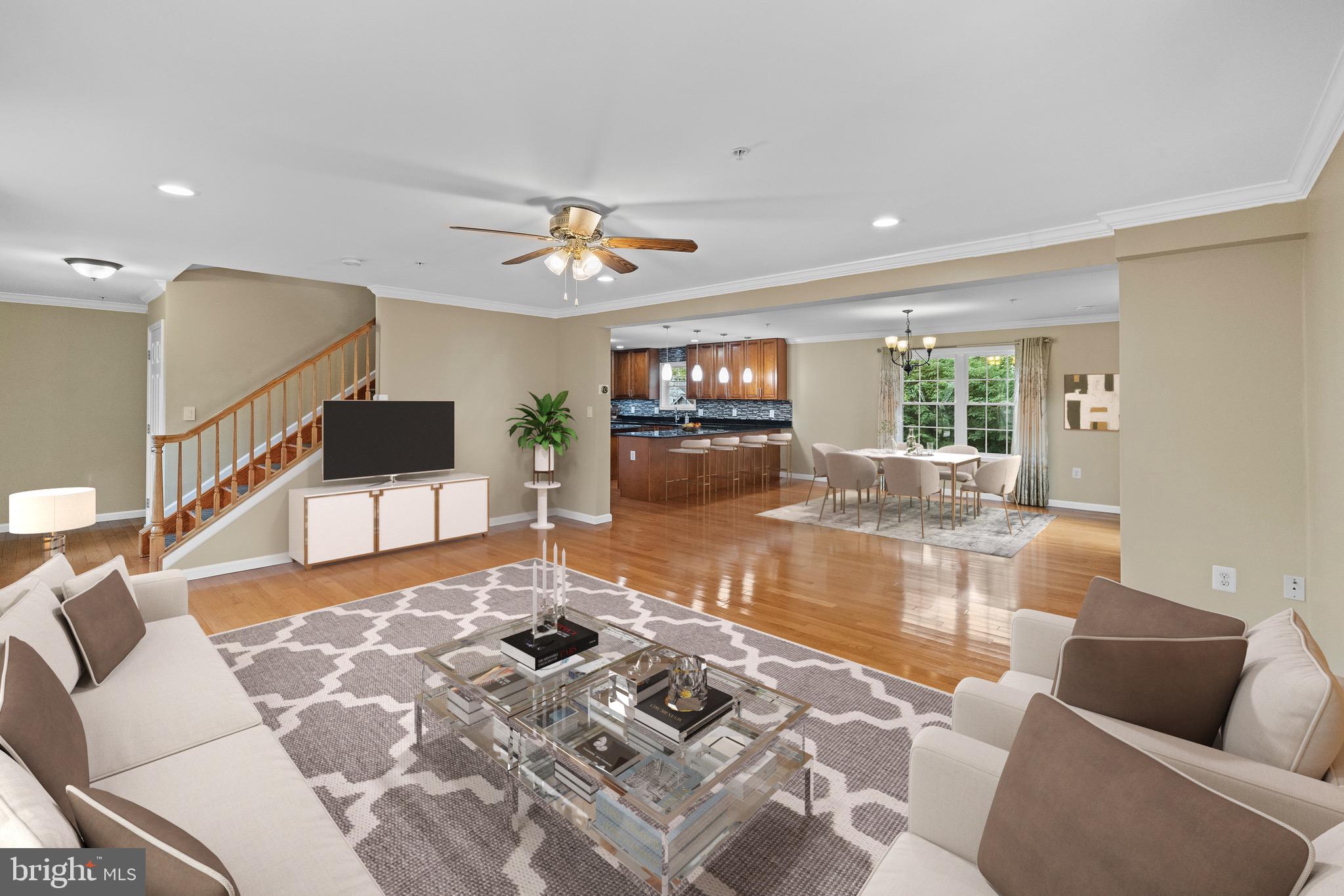 5402 Odell Road Beltsville, MD 20705 - Photo 2 of 69 a living room with furniture and a flat screen tv