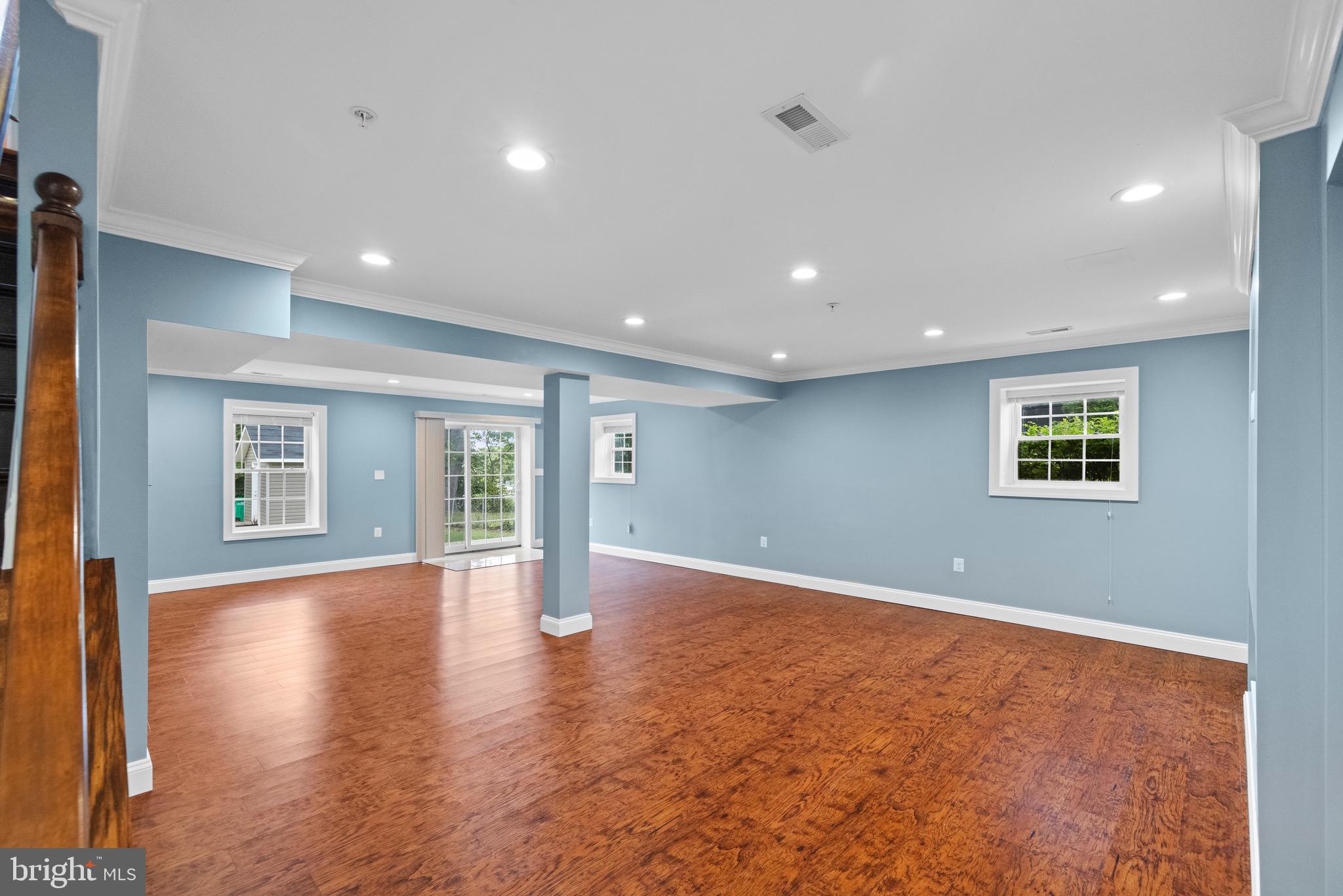 5402 Odell Road Beltsville, MD 20705 - Photo 24 of 69 an empty room with wooden floor and windows