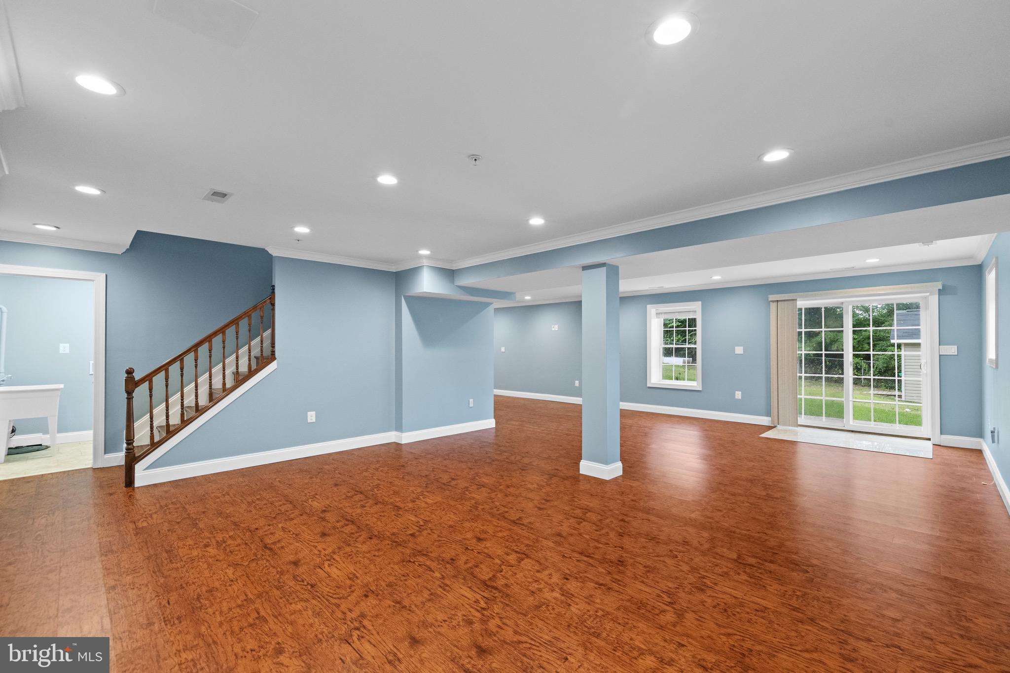 5402 Odell Road Beltsville, MD 20705 - Photo 25 of 69 a view of an empty room with wooden floor and a window
