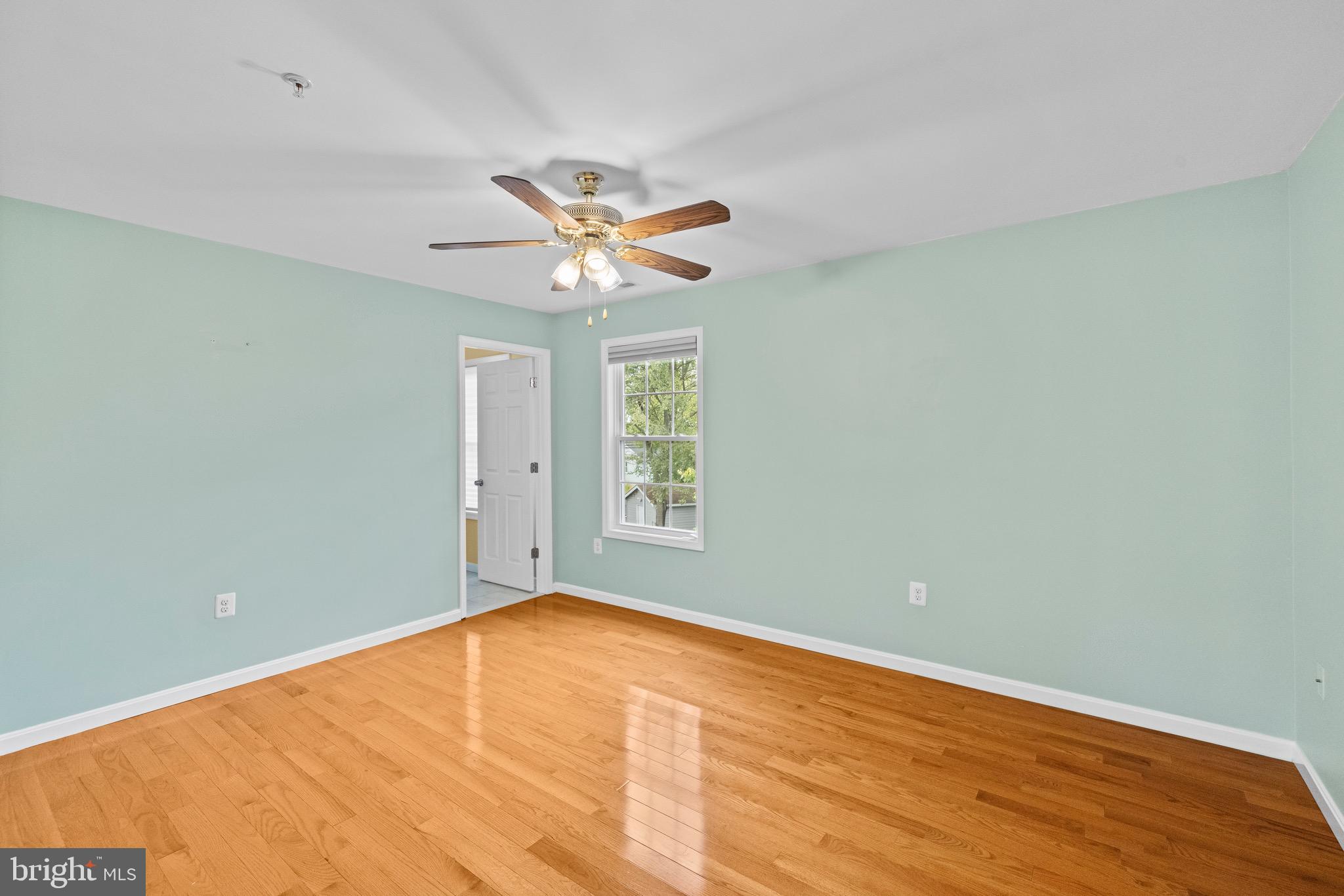 5402 Odell Road Beltsville, MD 20705 - Photo 34 of 69 an empty room with a window and a fan