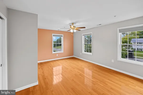 a view of balcony with wooden floor