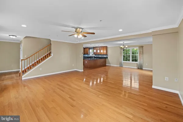 a view of a house with a yard patio and furniture
