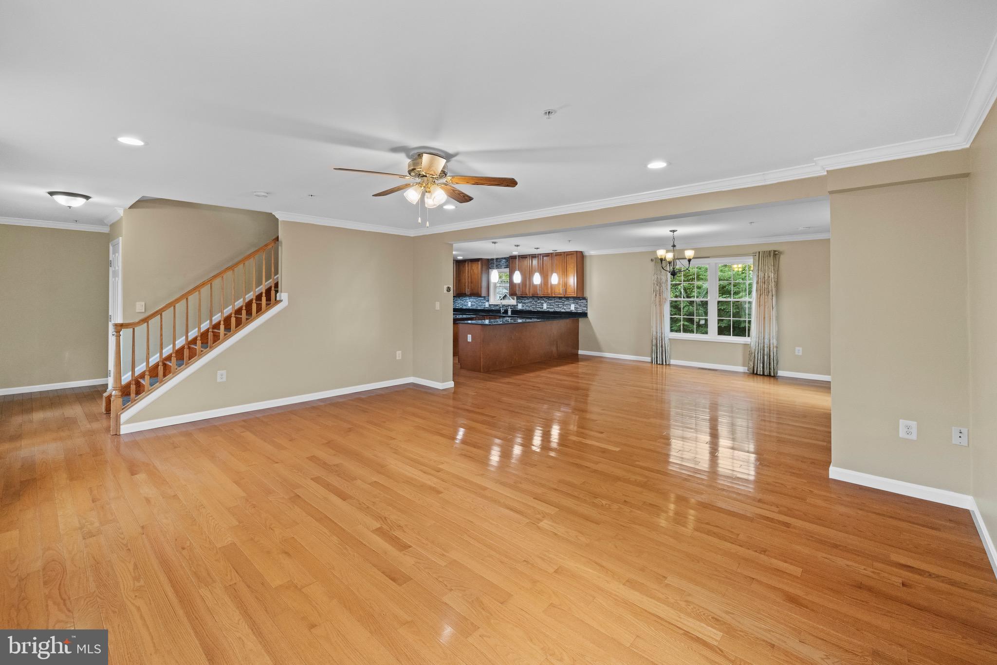 5402 Odell Road Beltsville, MD 20705 - Photo 49 of 69 a view of empty room with wooden floor and fan
