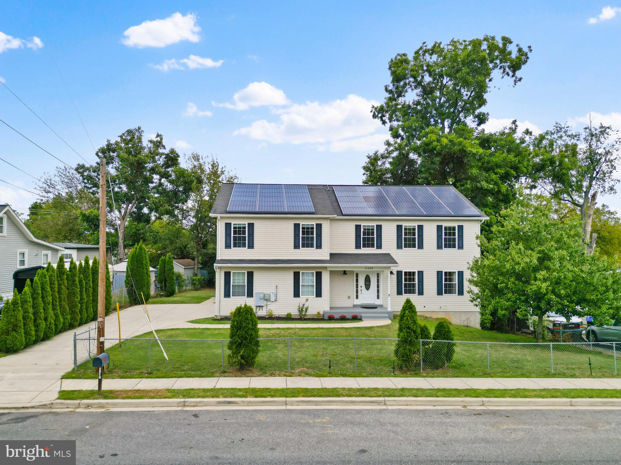 5402 Odell Road Beltsville, MD 20705 - Photo 65 of 69 a front view of a house with a yard