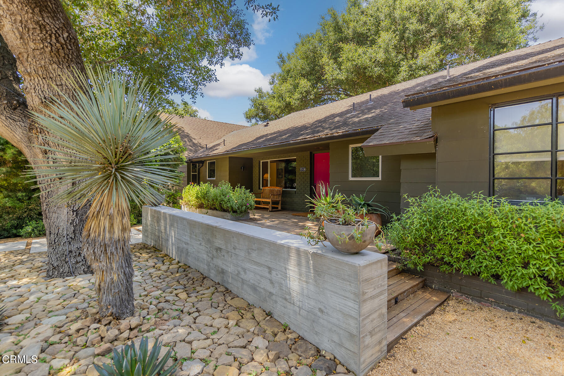 712 Cuyama Road Ojai, CA 93023 - Photo 11 of 50 a front view of a house with garden