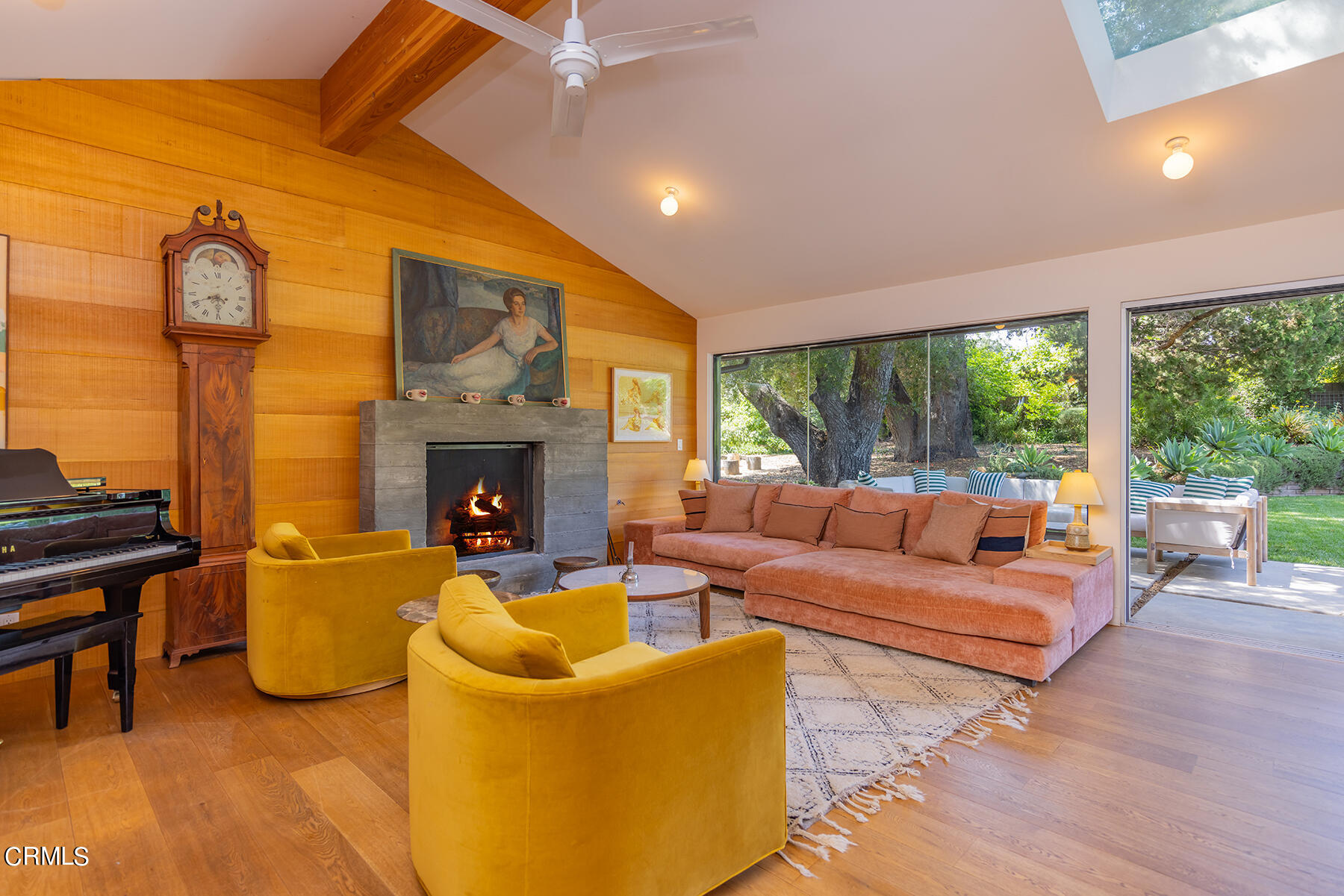 712 Cuyama Road Ojai, CA 93023 - Photo 13 of 50 a living room with fireplace furniture and a large window