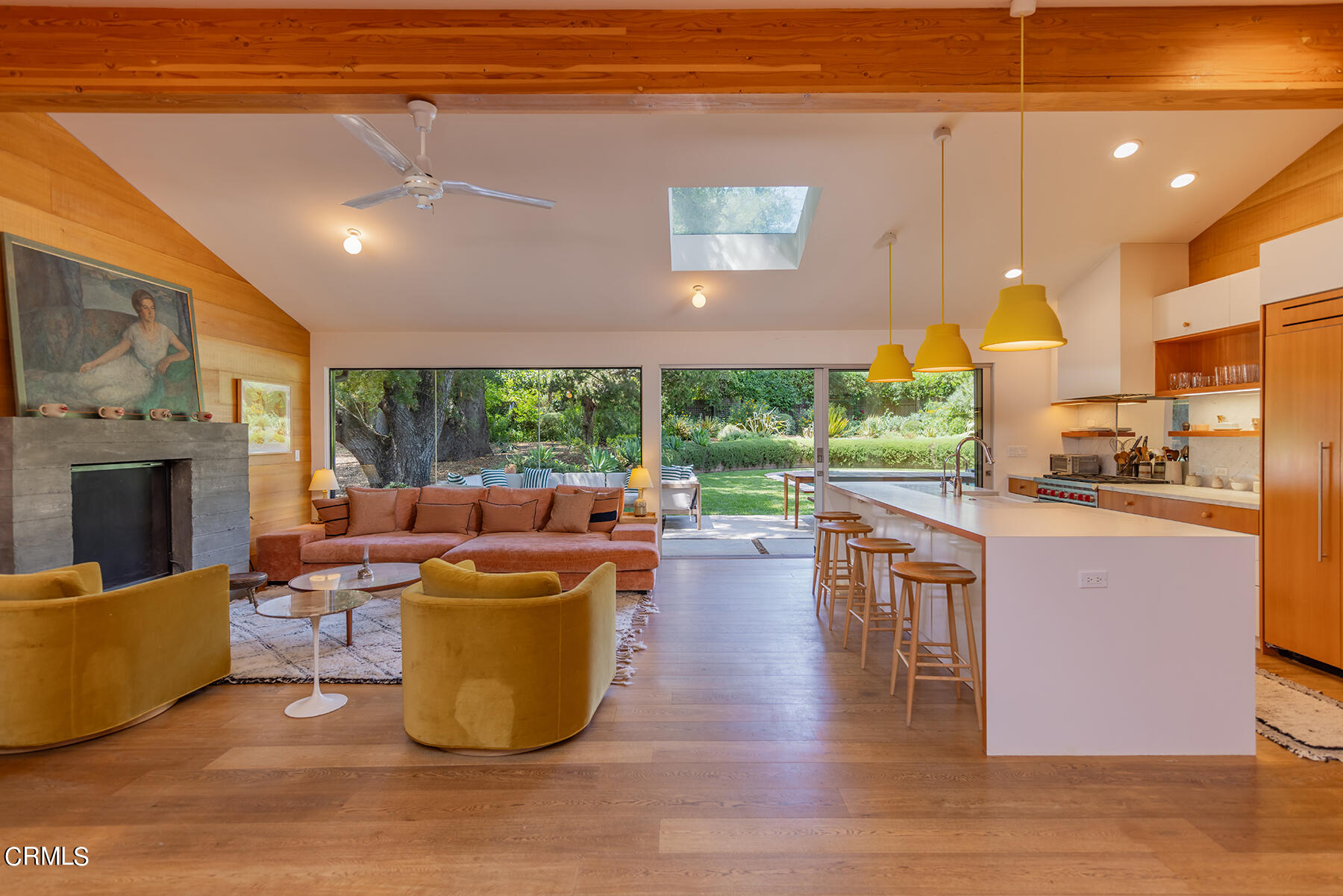 712 Cuyama Road Ojai, CA 93023 - Photo 14 of 50 a living room with fireplace furniture and a large window