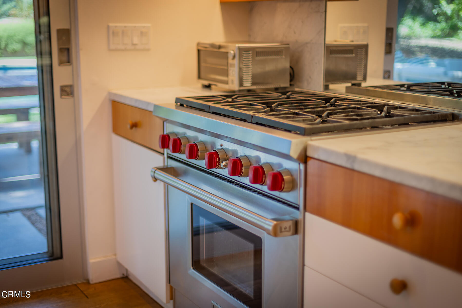 712 Cuyama Road Ojai, CA 93023 - Photo 17 of 50 a stove top oven sitting inside of a kitchen