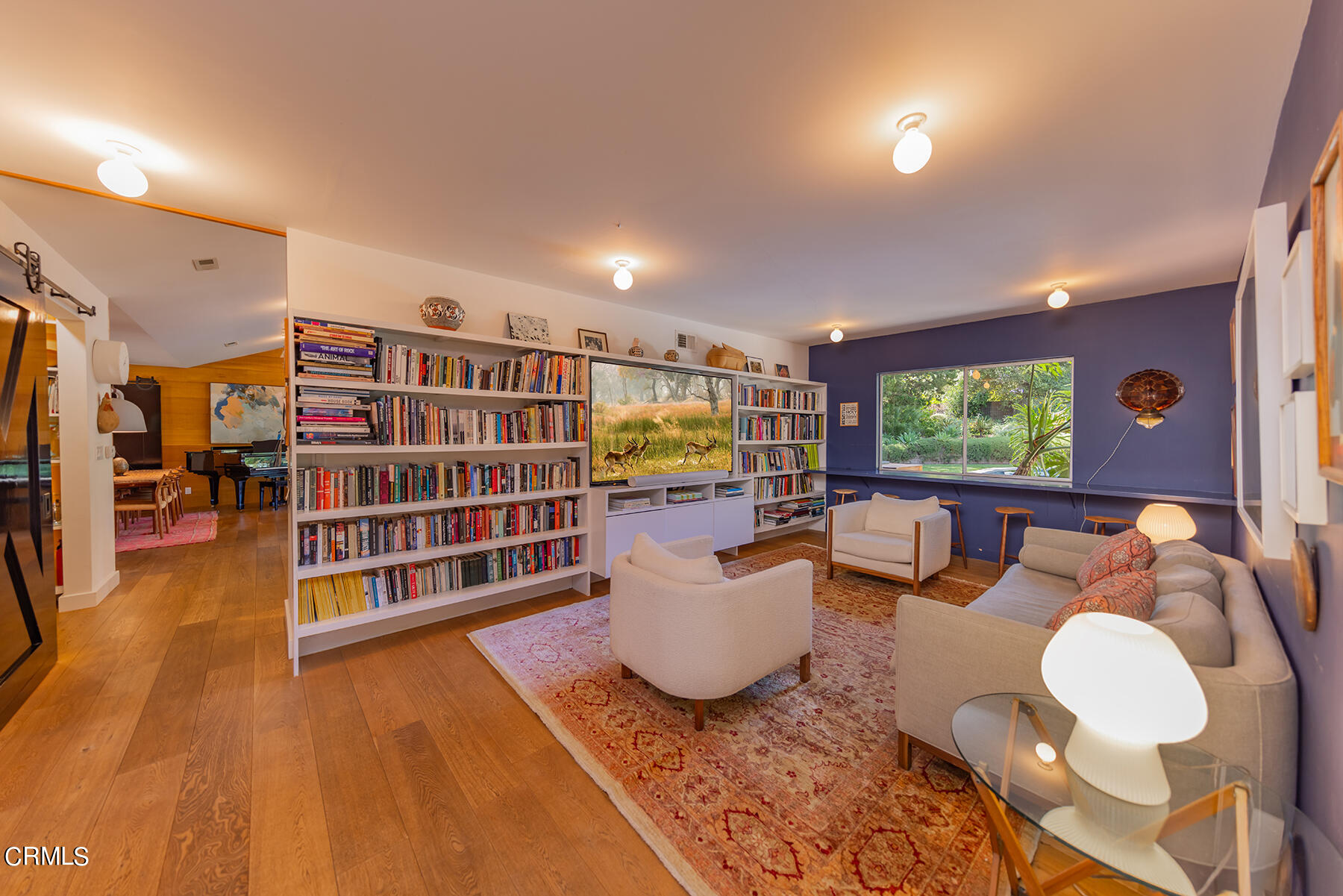 712 Cuyama Road Ojai, CA 93023 - Photo 20 of 50 a living room with furniture and a flat screen tv