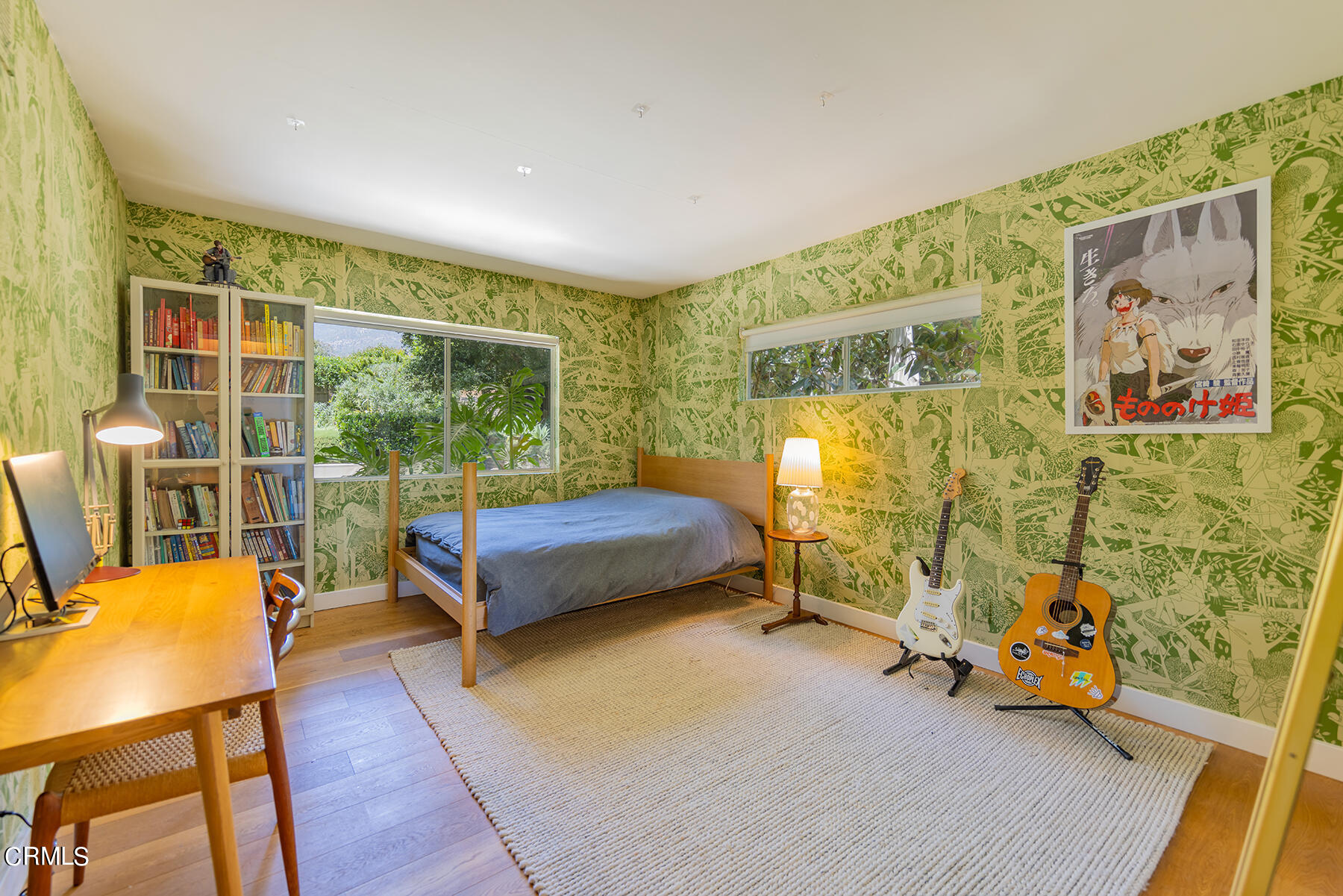 712 Cuyama Road Ojai, CA 93023 - Photo 35 of 50 a bedroom with a bed and wooden floor