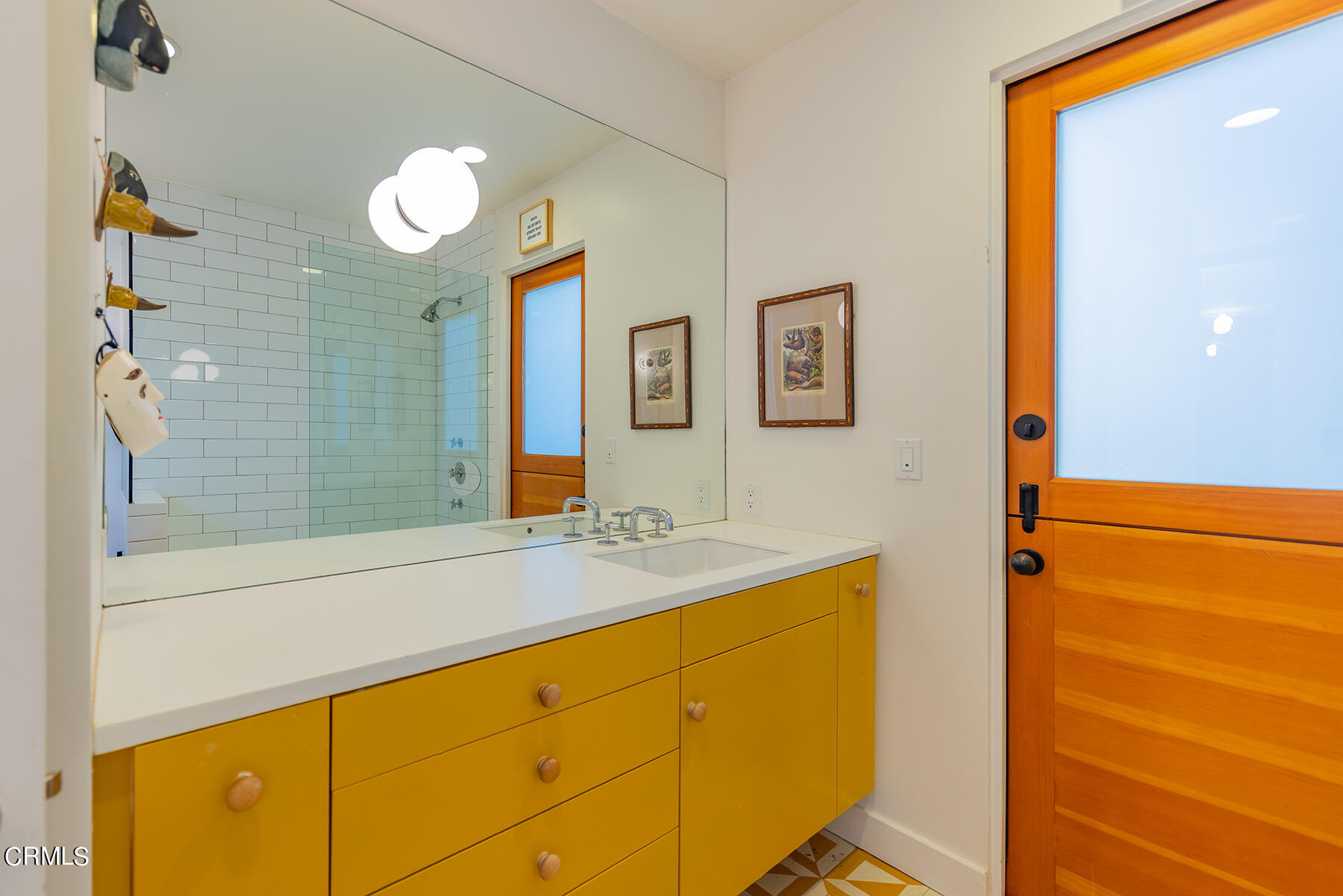 712 Cuyama Road Ojai, CA 93023 - Photo 38 of 50 a bathroom with a sink and a mirror