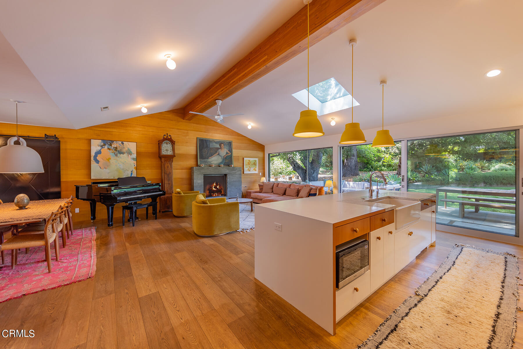 712 Cuyama Road Ojai, CA 93023 - Photo 4 of 50 a view of living room kitchen with stainless steel appliances and wooden floor