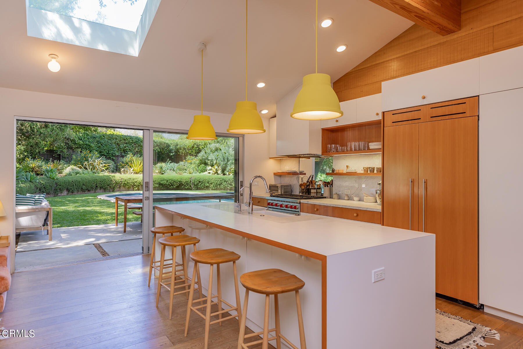 712 Cuyama Road Ojai, CA 93023 - Photo 5 of 50 a kitchen with a sink and wooden cabinets