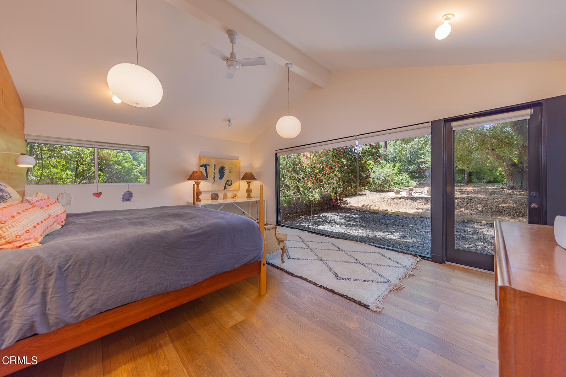 712 Cuyama Road Ojai, CA 93023 - Photo 6 of 50 a spacious bedroom with a large bed and a large window with outer view