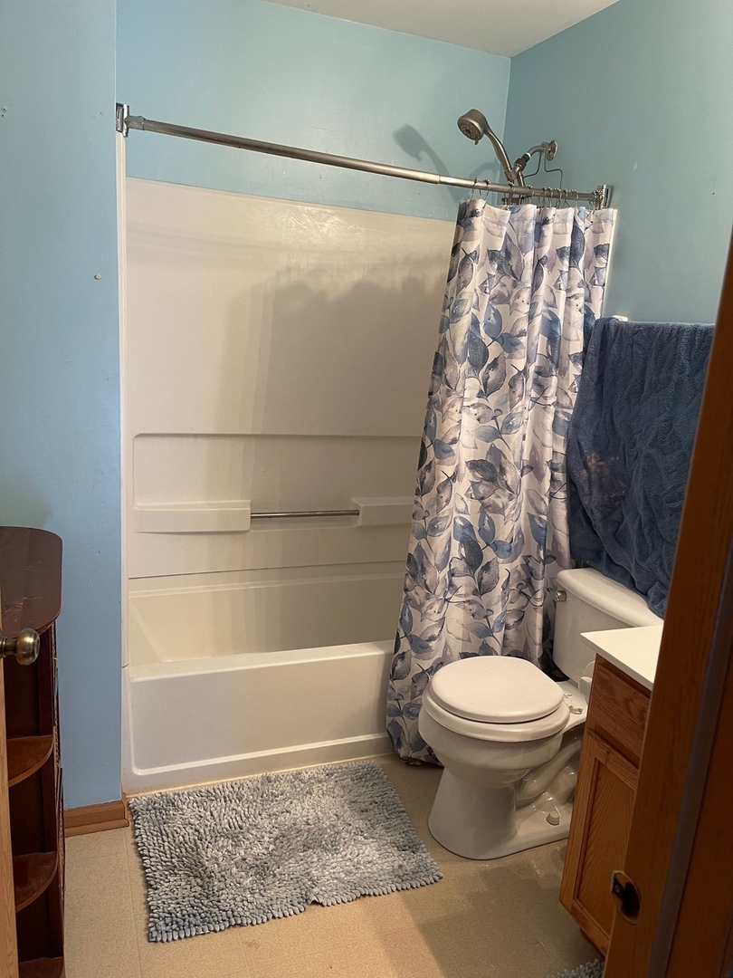 341 Richfield Trail Romeoville, IL 60446 - Photo 6 of 8 a bathroom with a toilet and a shower
