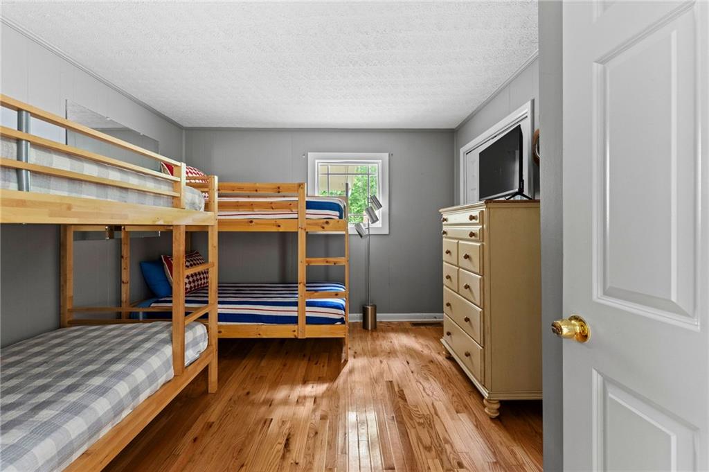 221 Reece Creek Road West Blairsville, GA 30512 - Photo 29 of 42 a view of room with furniture and wooden floor