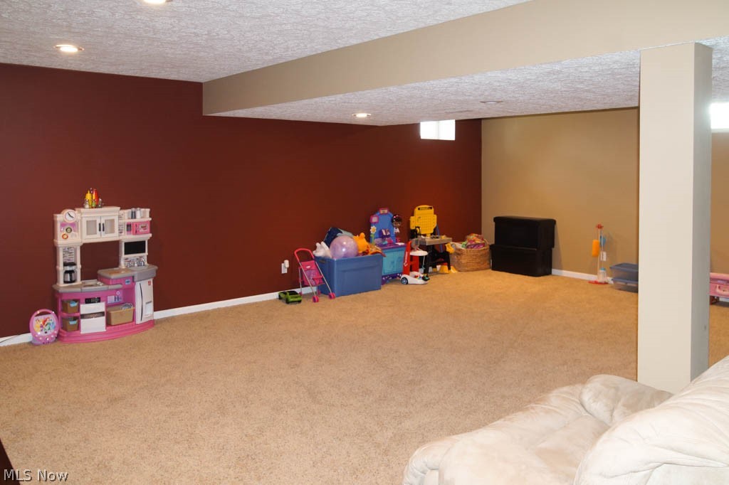 4293 Aylesford Road Uniontown, OH 44685 - Photo 21 of 29 Finished rec room on the lower level.