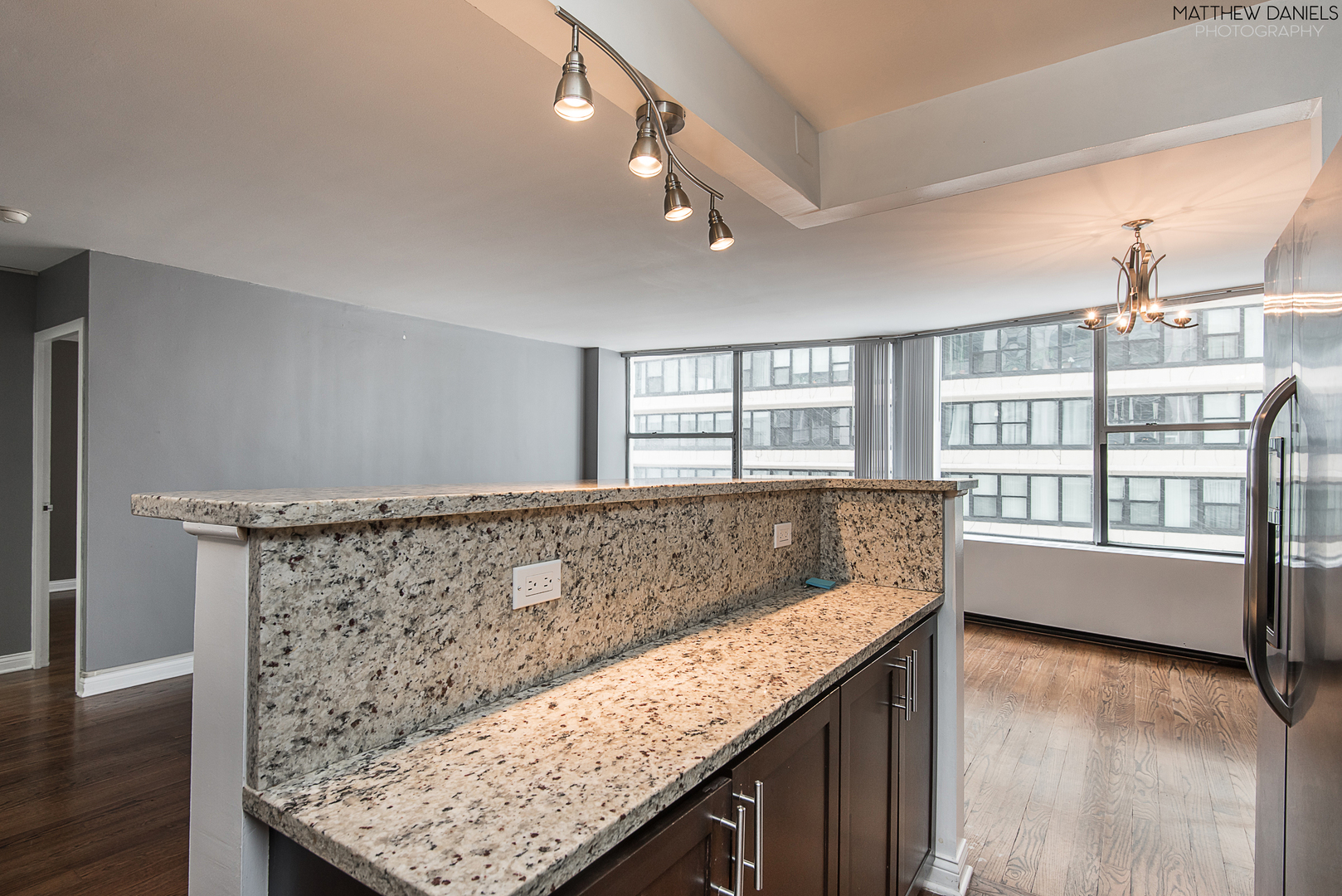 5757 North Sheridan Road, Unit 8C Chicago, IL 60660 - Photo 7 of 15 a view of kitchen and window
