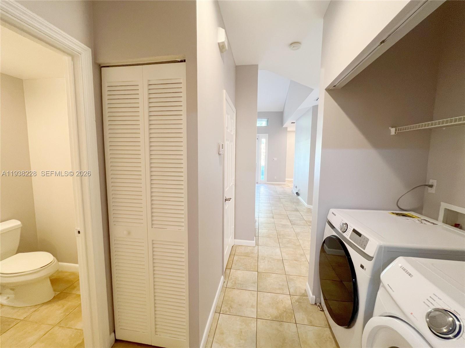 15827 Southwest 12th Street Pembroke Pines, FL 33027 - Photo 22 of 24 a bathroom with a sink and toilet