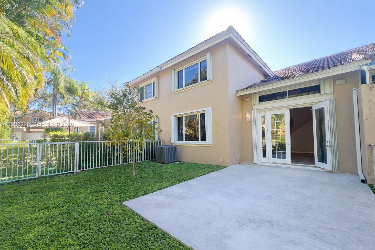 15827 Southwest 12th Street Pembroke Pines, FL 33027 - Photo 24 of 24 a view of a house with backyard and garden