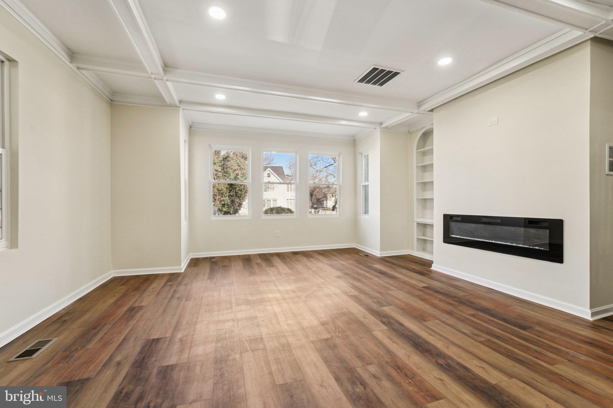 3603 Springdale Avenue Baltimore, MD 21216 - Photo 13 of 63 a view of wooden floor in a room