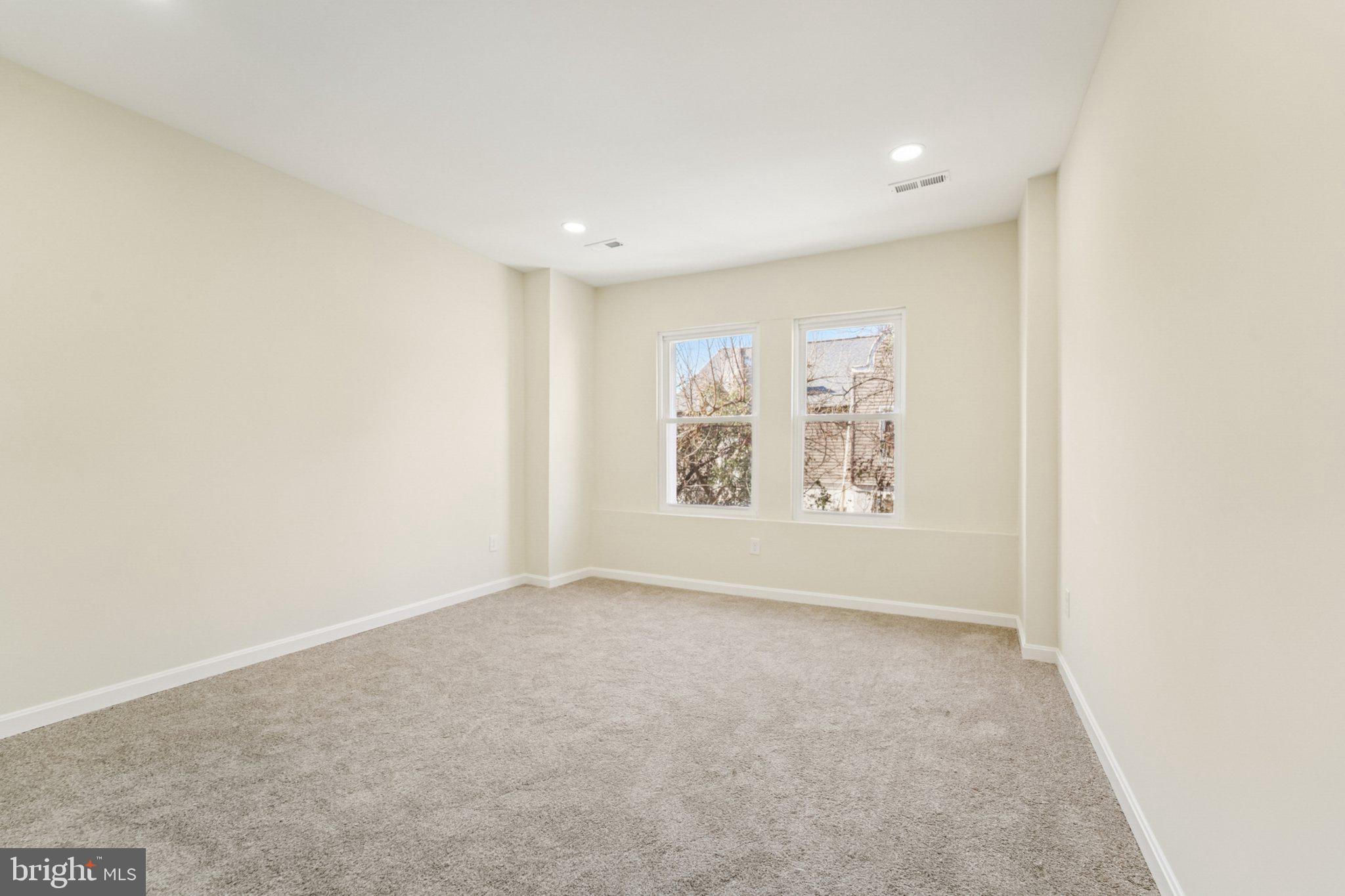 3603 Springdale Avenue Baltimore, MD 21216 - Photo 29 of 63 an empty room with windows