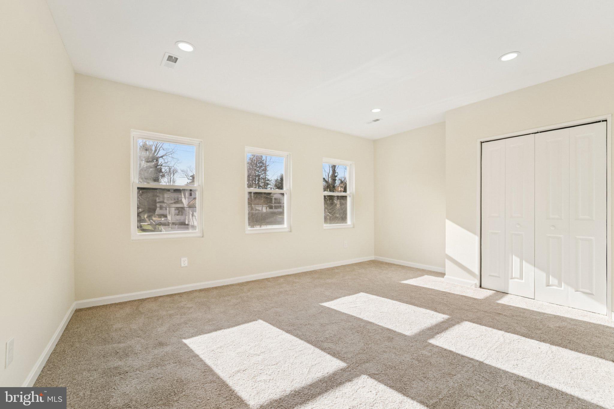 3603 Springdale Avenue Baltimore, MD 21216 - Photo 33 of 63 an empty room with windows