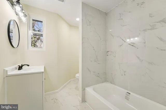 a view of balcony with wooden floor and fence
