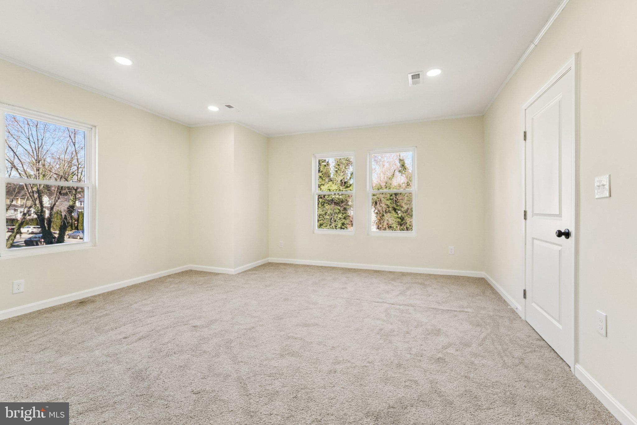 3603 Springdale Avenue Baltimore, MD 21216 - Photo 36 of 63 an empty room with windows