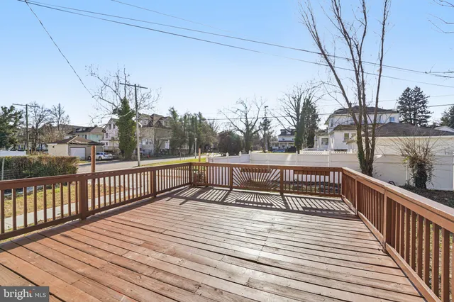 a house view with wooden fence